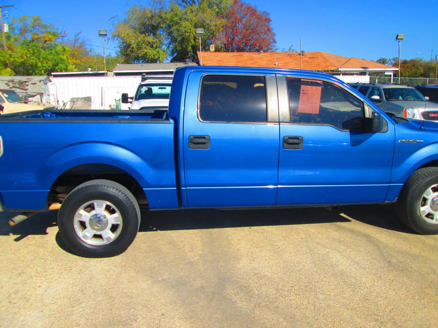 2009 BLUE Ford F-150 (1FTRW12W09F) with an 4.6L V8 OHC FFV engine, 4-Speed Automatic transmission, located at 1815 NE 28th St., Fort Worth, TX, 76106, (817) 625-6251, 32.795582, -97.333069 - Photo#3